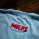 Milfs Empire Shirt BLACK ON SKY BLUE (inkl. Nackendruck)